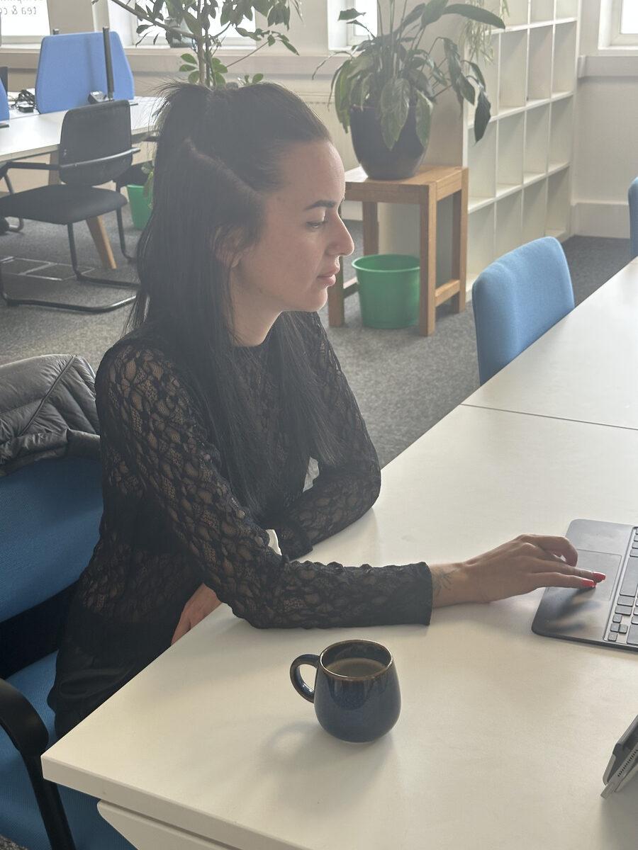 A member working on a laptop at Worcester Coworking