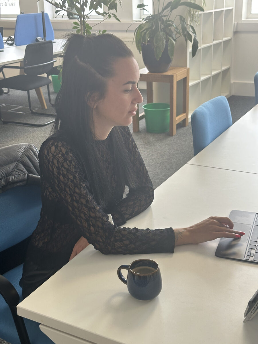 A member working on a laptop at Worcester Coworking